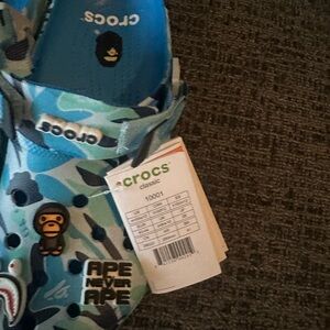 CROCS Kids One Piece in Blue and Black